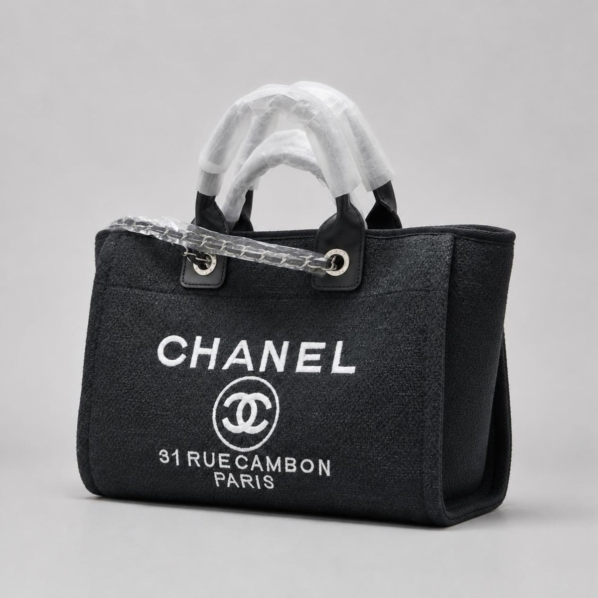Black Woven Canvas Tote Bag with White Embroidered Lettering and Silver Chain Strap
