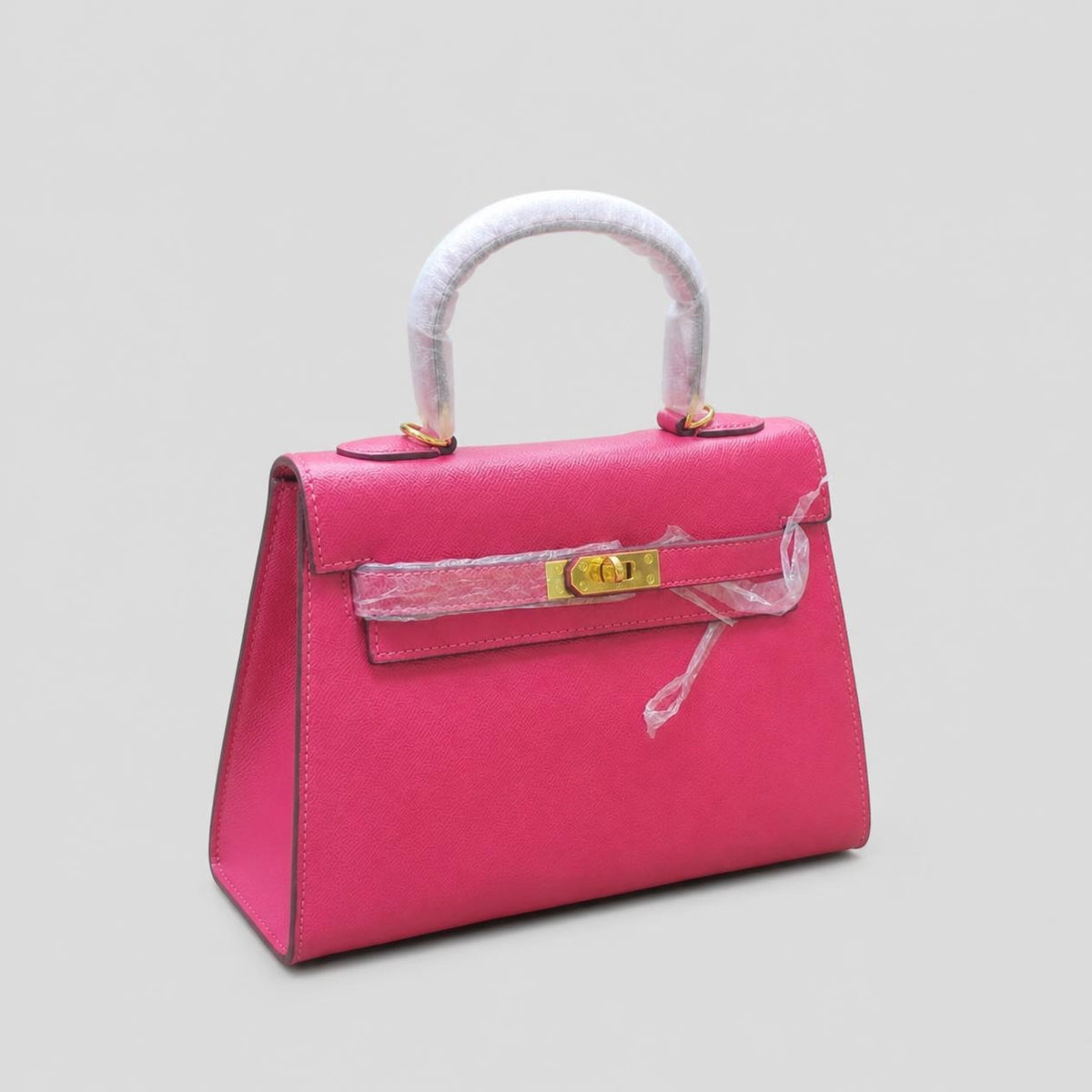 Hot Pink Textured Mini Top-Handle Bag with Gold Turn-Lock Closure
