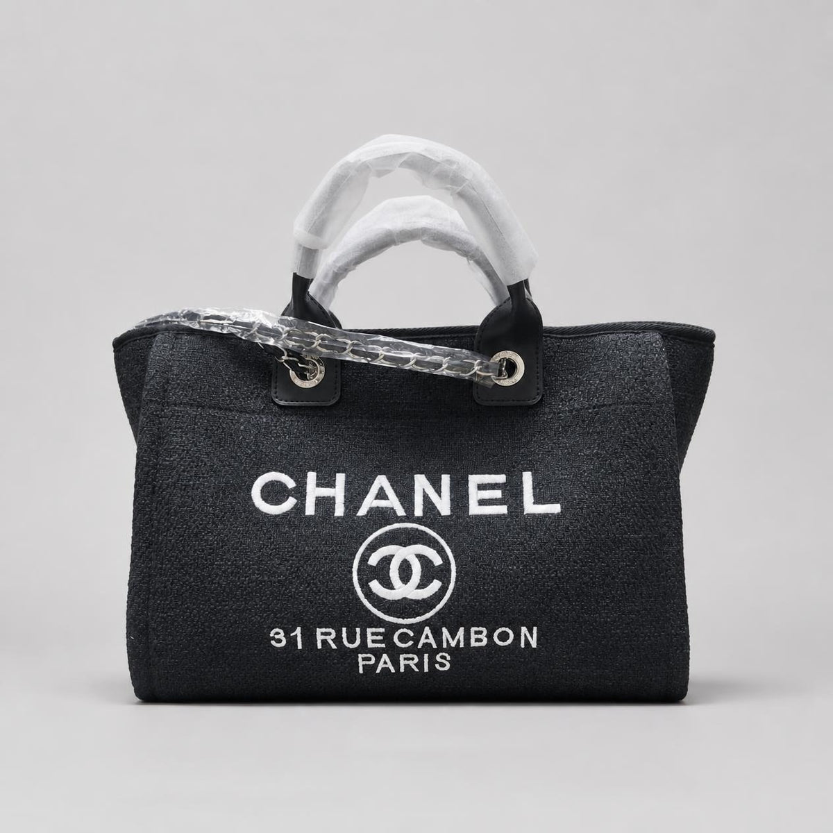 Black Woven Canvas Tote Bag with White Embroidered Lettering and Silver Chain Strap