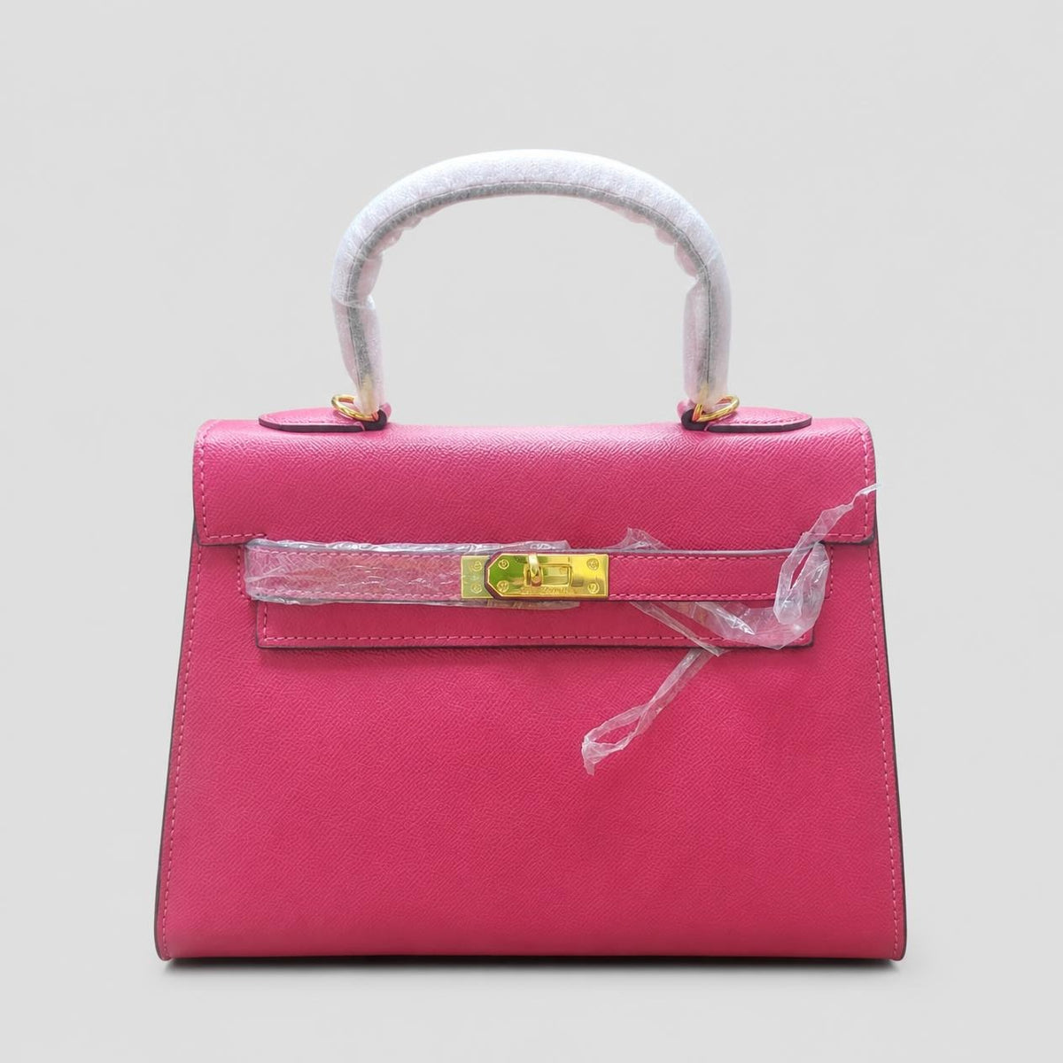 Hot Pink Textured Mini Top-Handle Bag with Gold Turn-Lock Closure